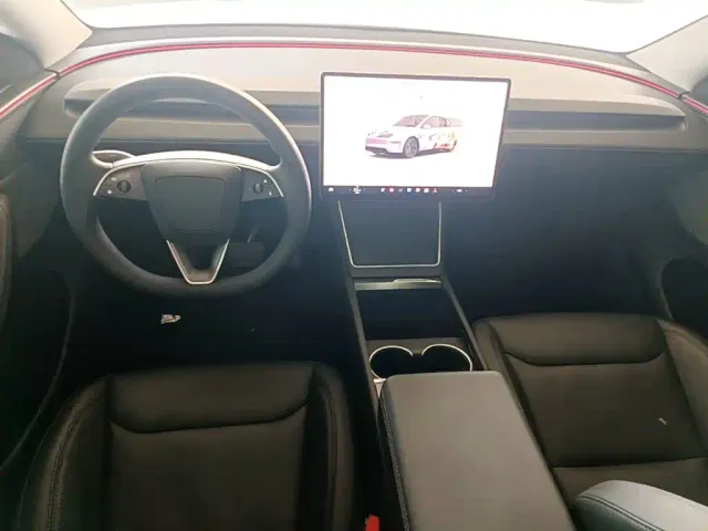 Tesla Model Y — Фото автомобиля 9