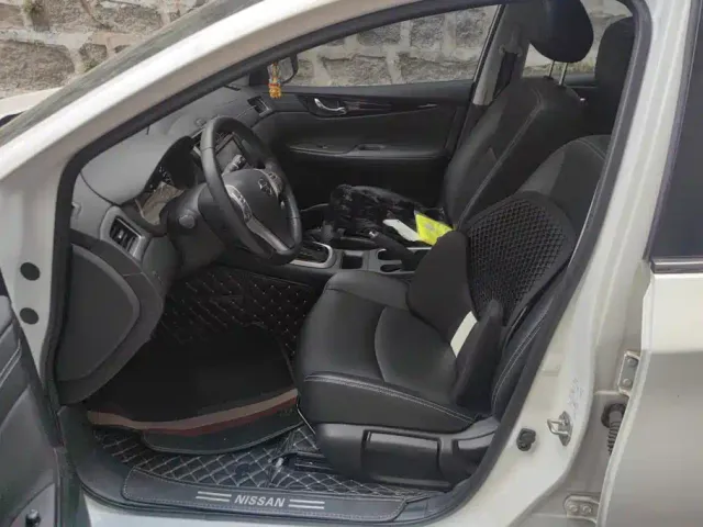 Nissan Tiida — Фото автомобиля 9