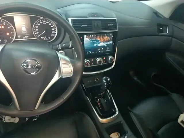 Nissan Tiida — Фото автомобиля 12