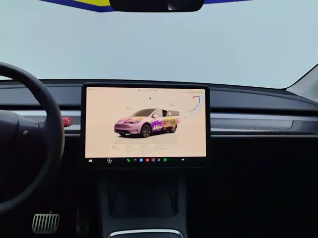Tesla Model Y — Фото автомобиля 13