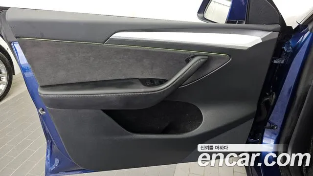Tesla Model Y — Фото автомобиля 19