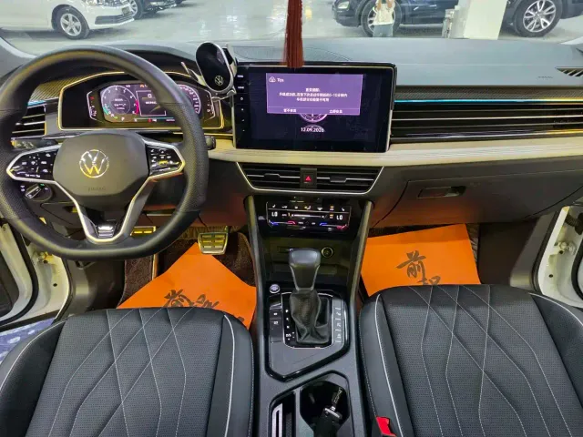 Volkswagen Tiguan L — Фото автомобиля 4