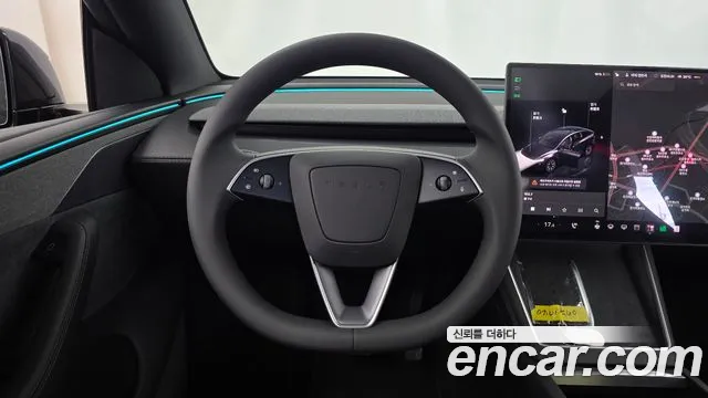 Tesla Model Y — Фото автомобиля 13
