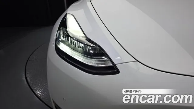 Tesla Model Y — Фото автомобиля 19