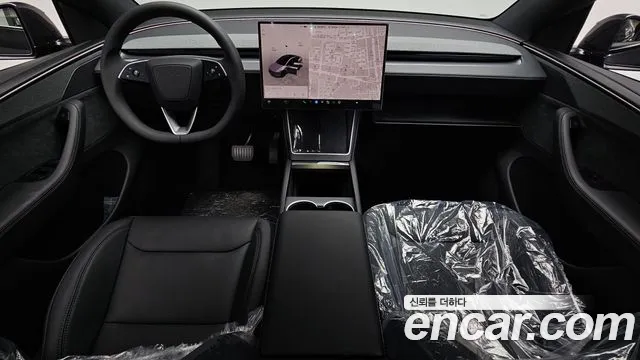 Tesla Model Y — Фото автомобиля 6