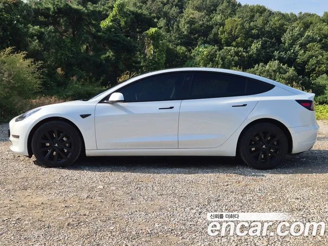 Tesla Model 3 — Фото автомобиля 6