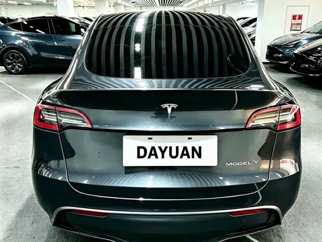 Tesla Model Y — Фото автомобиля 8