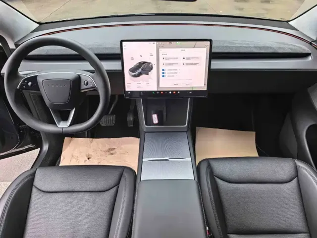 Tesla Model Y — Фото автомобиля 5