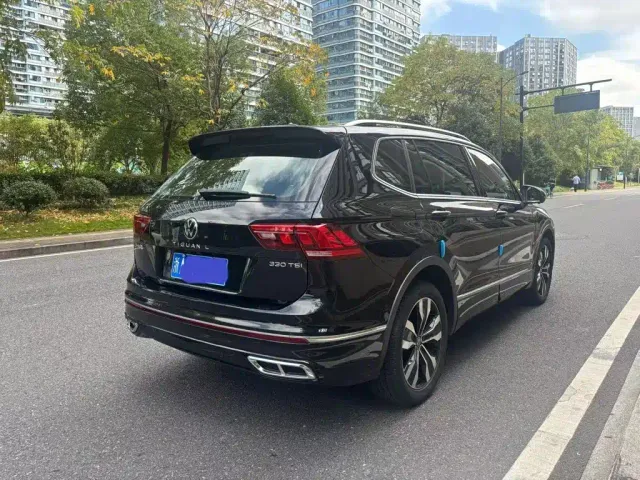 Volkswagen Tiguan L — Фото автомобиля 4