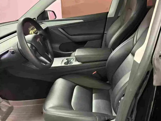 Tesla Model Y — Фото автомобиля 15