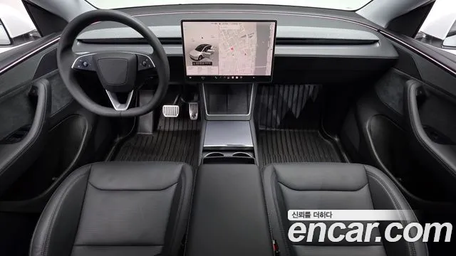 Tesla Model Y — Фото автомобиля 10