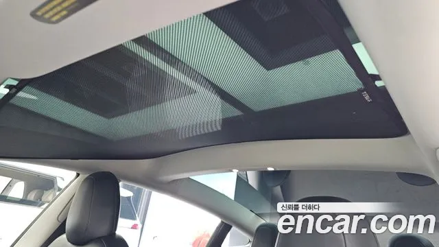 Tesla Model 3 — Фото автомобиля 14