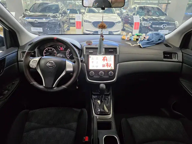 Nissan Tiida — Фото автомобиля 8