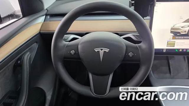 Tesla Model Y — Фото автомобиля 14