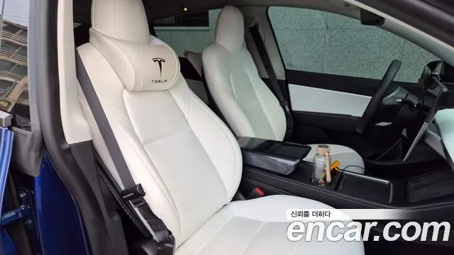 Tesla Model Y — Фото автомобиля 10