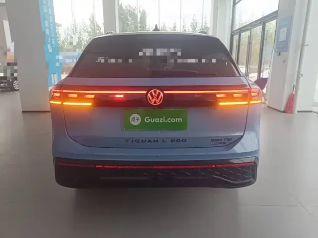 Volkswagen Tiguan L — Фото автомобиля 5