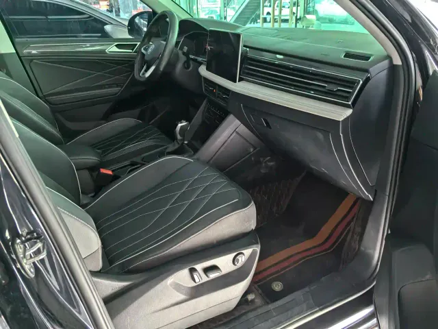 Volkswagen Tiguan L — Фото автомобиля 11