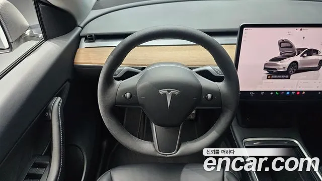 Tesla Model Y — Фото автомобиля 11