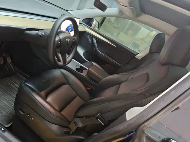 Tesla Model Y — Фото автомобиля 14
