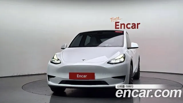 Tesla Model Y — Фото автомобиля 2