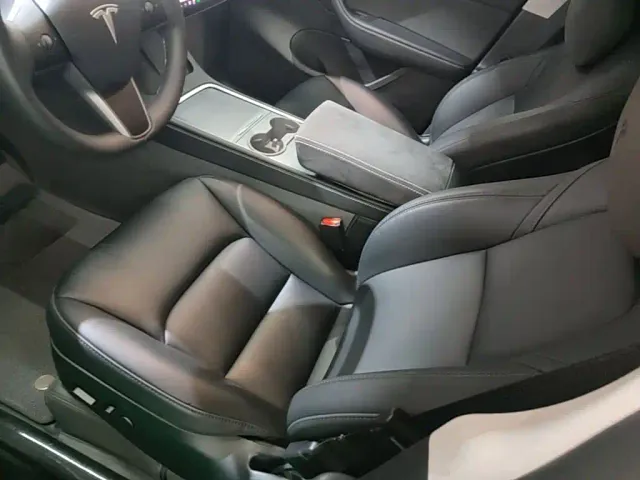 Tesla Model Y — Фото автомобиля 14