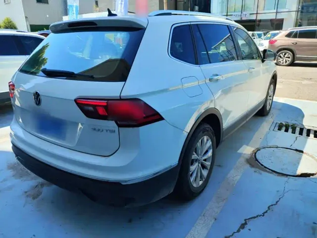 Volkswagen Tiguan L — Фото автомобиля 6