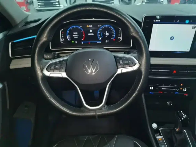 Volkswagen Tiguan L — Фото автомобиля 10