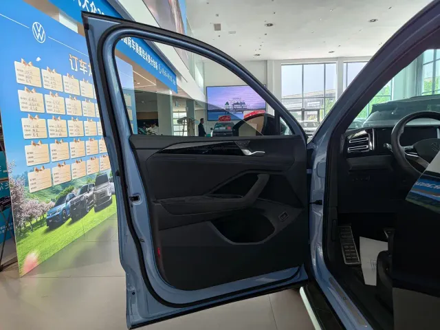Volkswagen Tiguan L — Фото автомобиля 5