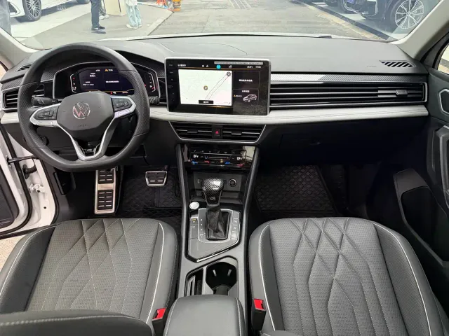 Volkswagen Tiguan L — Фото автомобиля 12