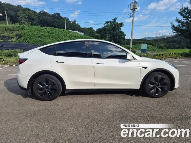 Tesla Model Y — Фото автомобиля 5