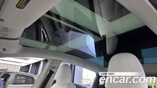 Tesla Model Y — Фото автомобиля 17