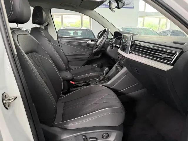 Volkswagen Tiguan L — Фото автомобиля 10