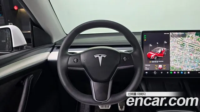 Tesla Model Y — Фото автомобиля 18
