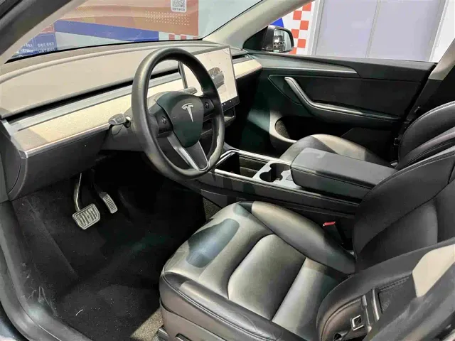Tesla Model Y — Фото автомобиля 4