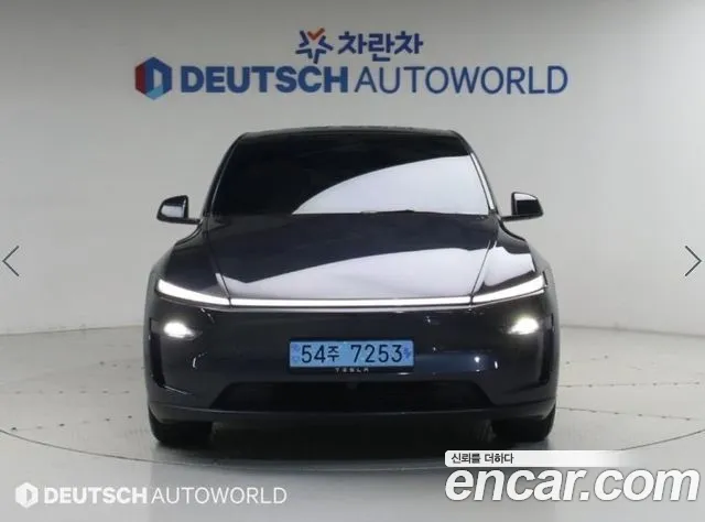 Tesla Model Y — Фото автомобиля 3