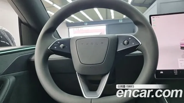 Tesla Model Y — Фото автомобиля 9