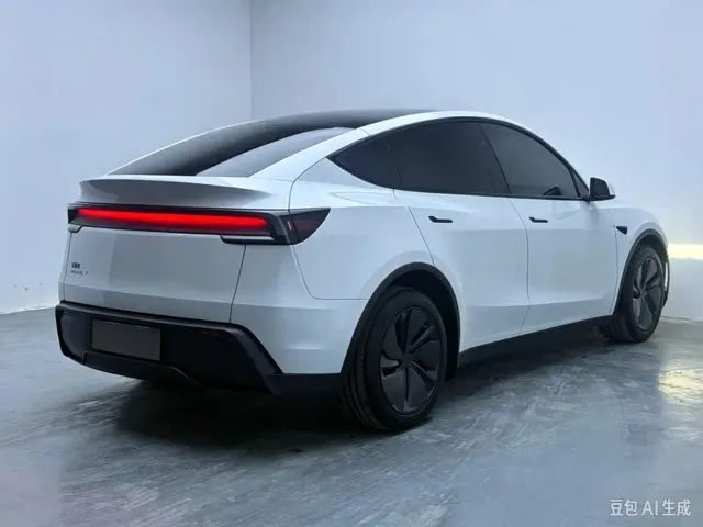 Tesla Model Y — Фото автомобиля 5