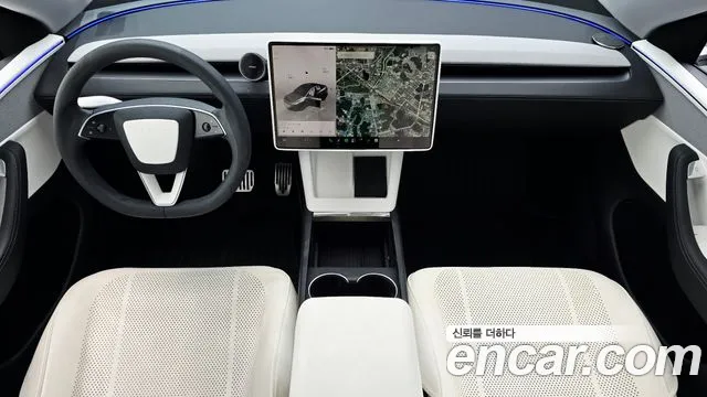 Tesla Model Y — Фото автомобиля 10