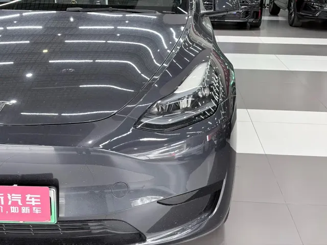 Tesla Model Y — Фото автомобиля 4