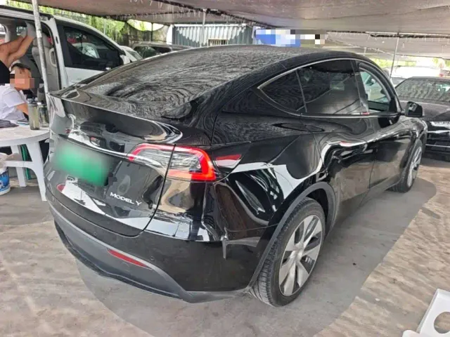 Tesla Model Y — Фото автомобиля 6