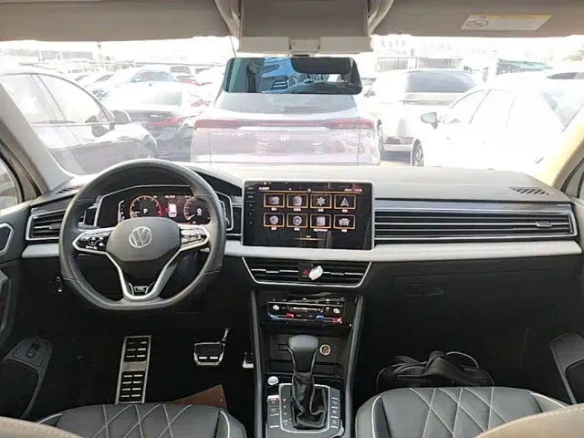 Volkswagen Tiguan L — Фото автомобиля 9