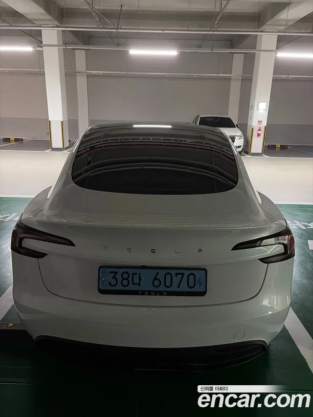 Tesla Model 3 — Фото автомобиля 4