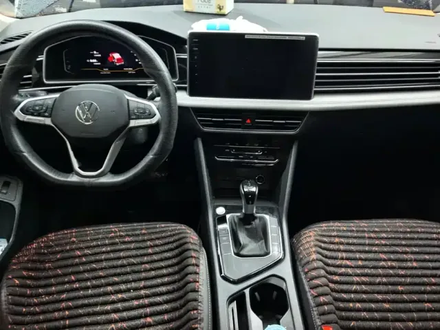 Volkswagen Tiguan L — Фото автомобиля 12