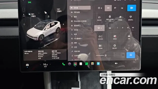 Tesla Model Y — Фото автомобиля 18