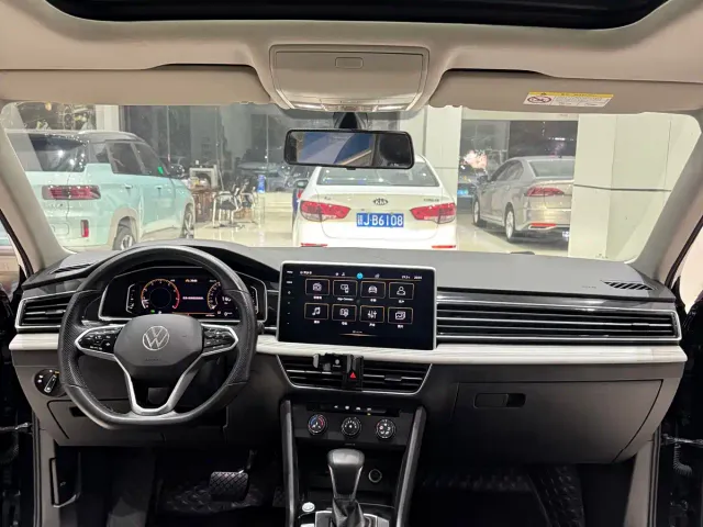 Volkswagen Tiguan L — Фото автомобиля 7