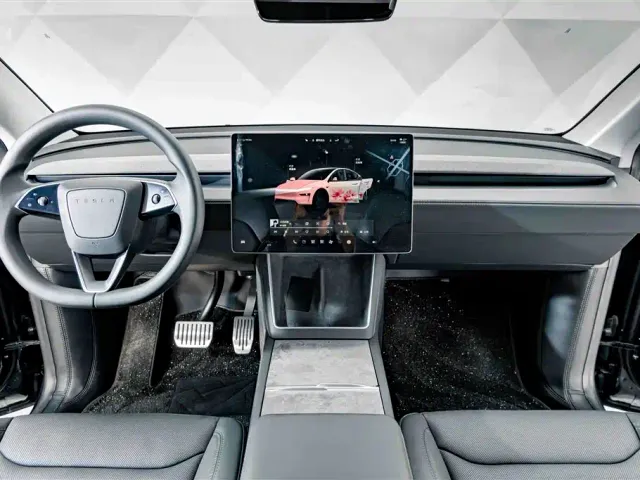 Tesla Model Y — Фото автомобиля 12