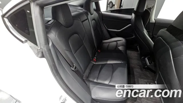 Tesla Model 3 — Фото автомобиля 11