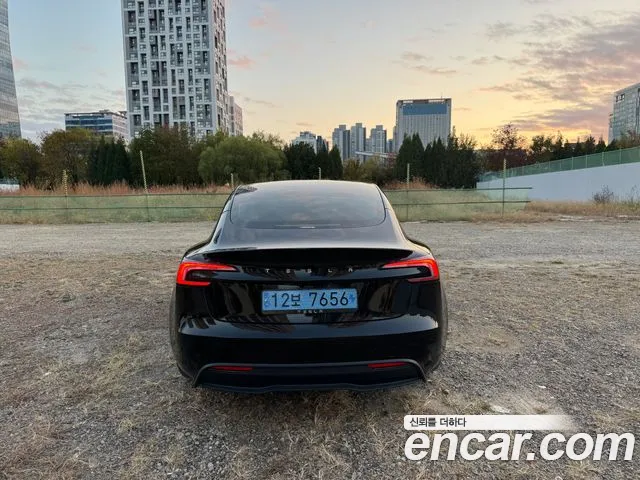 Tesla Model 3 — Фото автомобиля 4