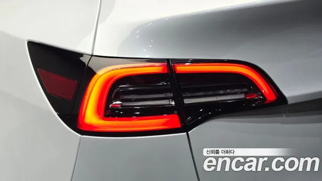 Tesla Model Y — Фото автомобиля 7