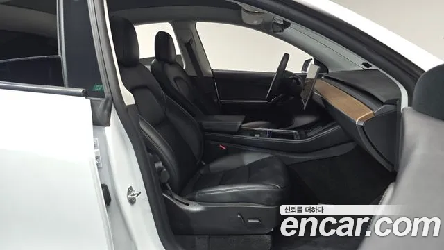 Tesla Model Y — Фото автомобиля 10